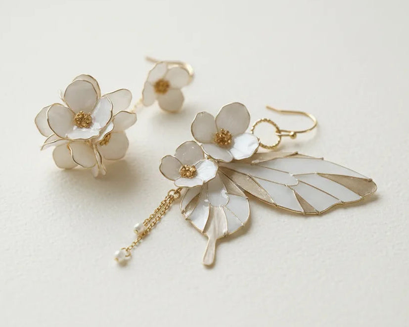 Sparkling Made flower butterfly earrings with pearl shine featuring layered petals and delicate butterfly details